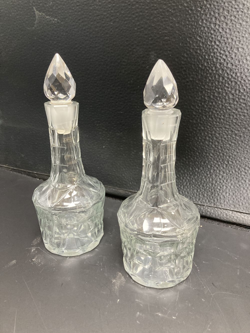 A pair of Dutch cut glass cruet bottles, late 18th century, 19.5cm